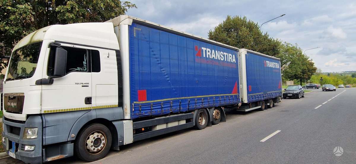 MAN TGX, dropside with curtains