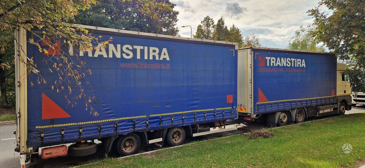 MAN TGX, dropside with curtains