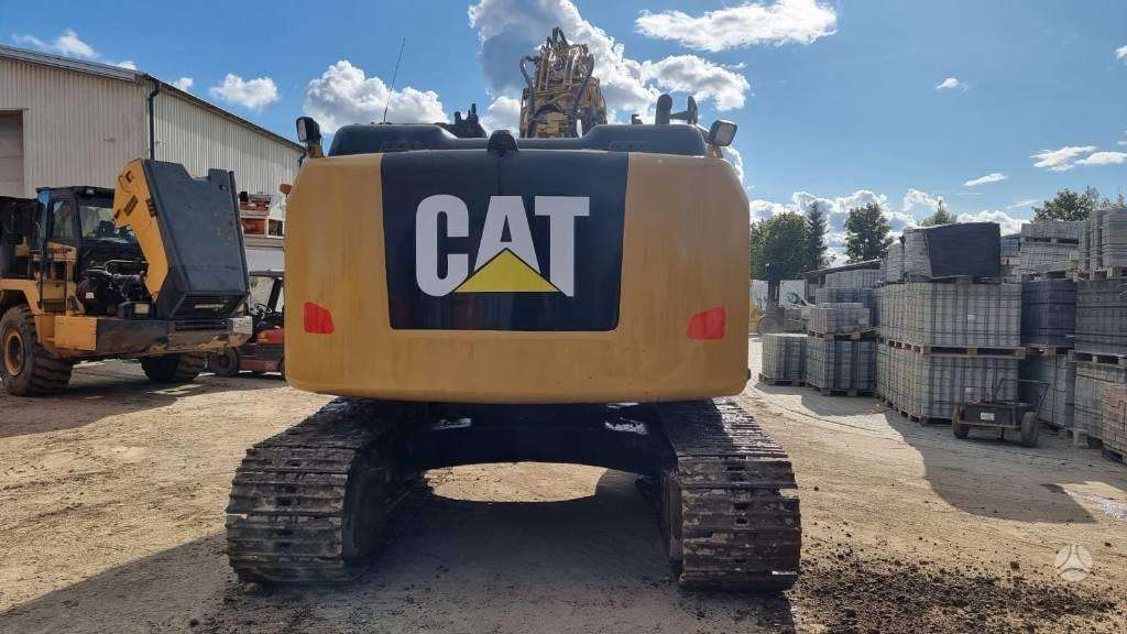 Caterpillar 320 E, экскаваторы