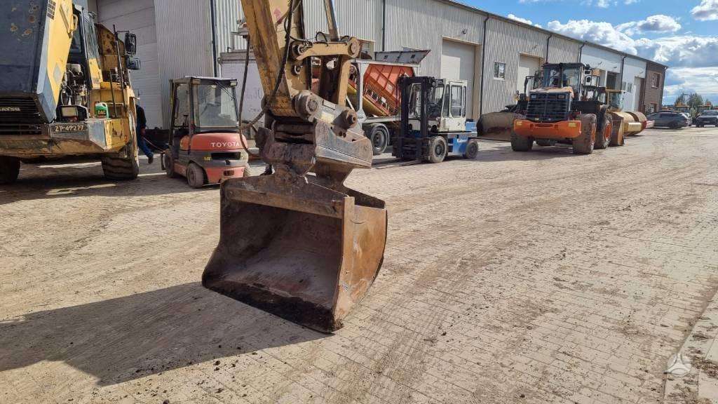Caterpillar 320 E, экскаваторы