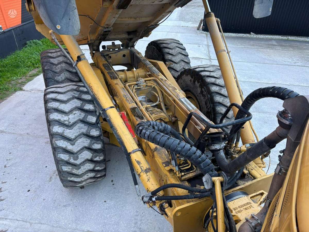 Caterpillar 740 6x6, самосвалы