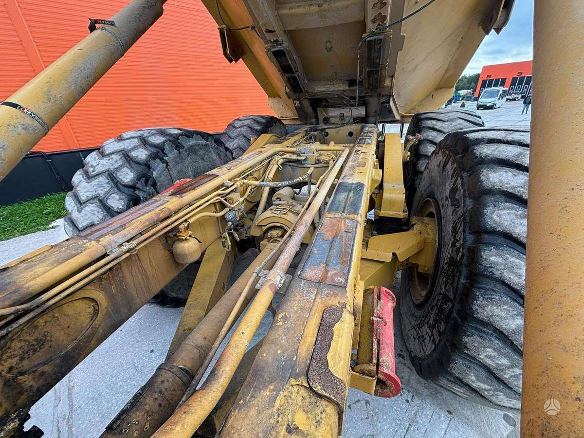 Caterpillar 740 6x6, самосвалы