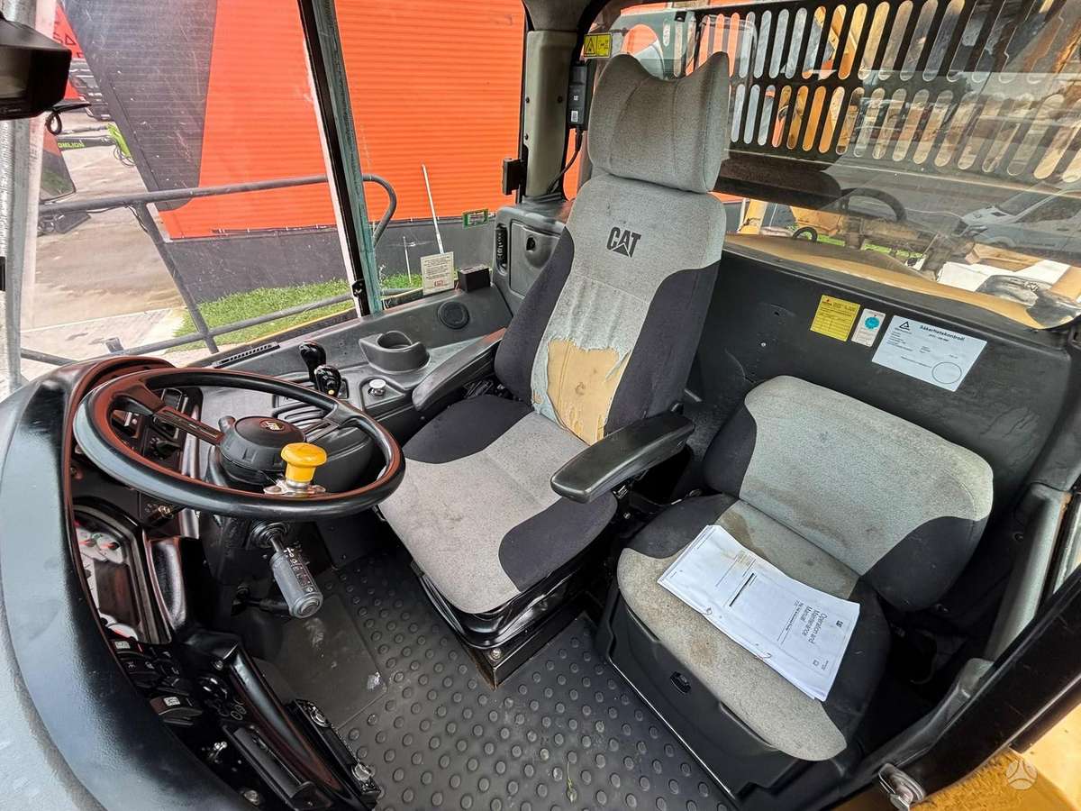 Caterpillar 740 6x6, самосвалы