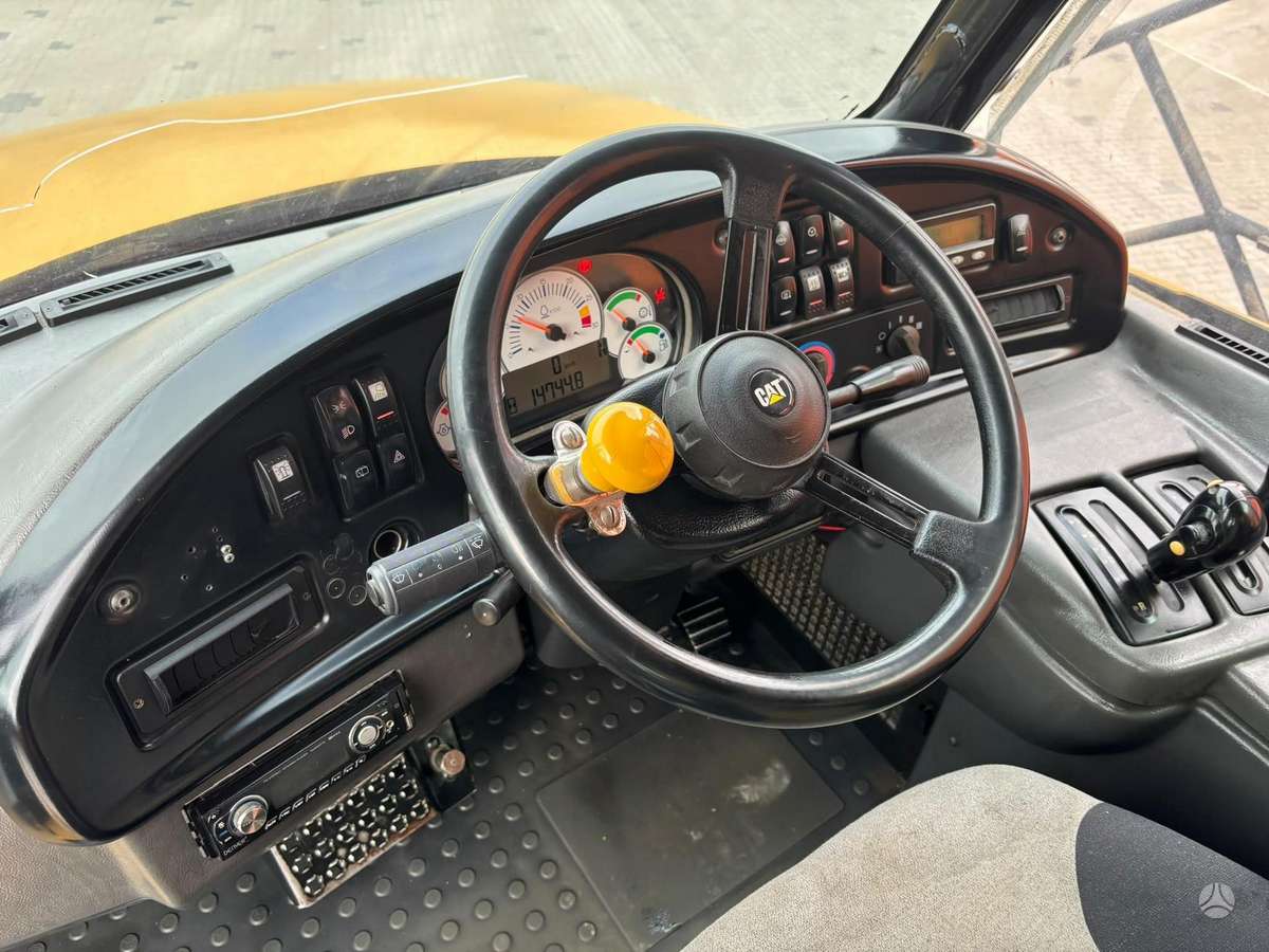 Caterpillar 740 6x6, самосвалы