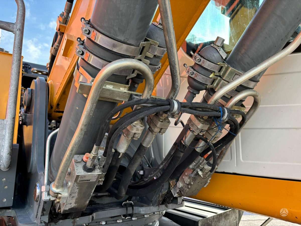 Liebherr L22M Litronic, экскаваторы