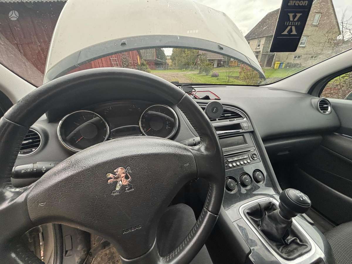 Peugeot 5008 2011 — photo 34