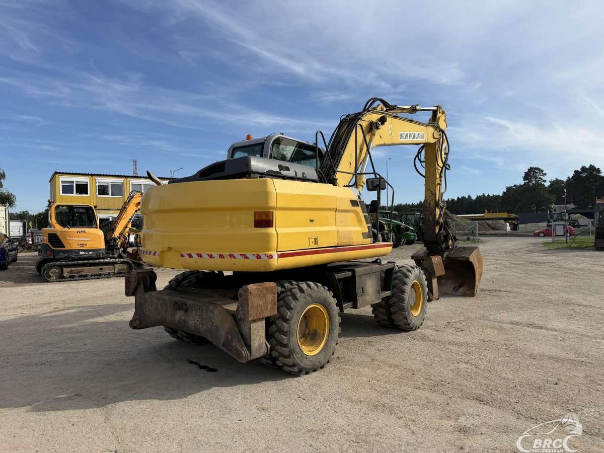 New Holland MH PLUS Engcon rototilt sist.., экскаваторы