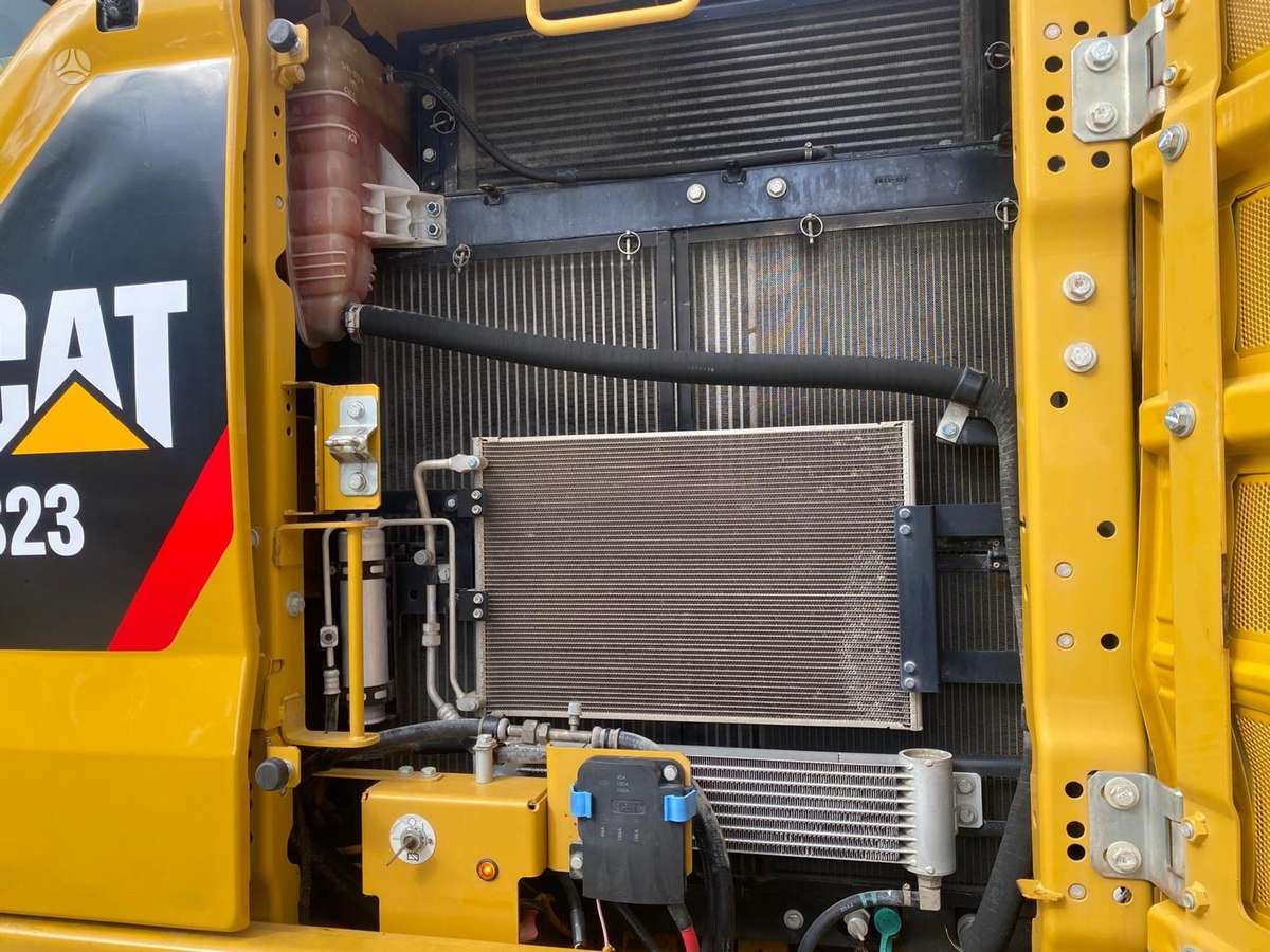 Caterpillar 323, экскаваторы