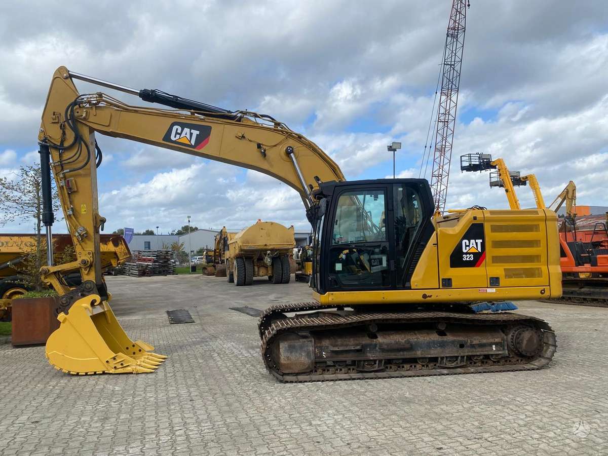 Caterpillar 323, экскаваторы