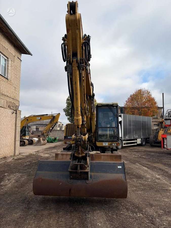 Caterpillar M315, ekskavatoriai