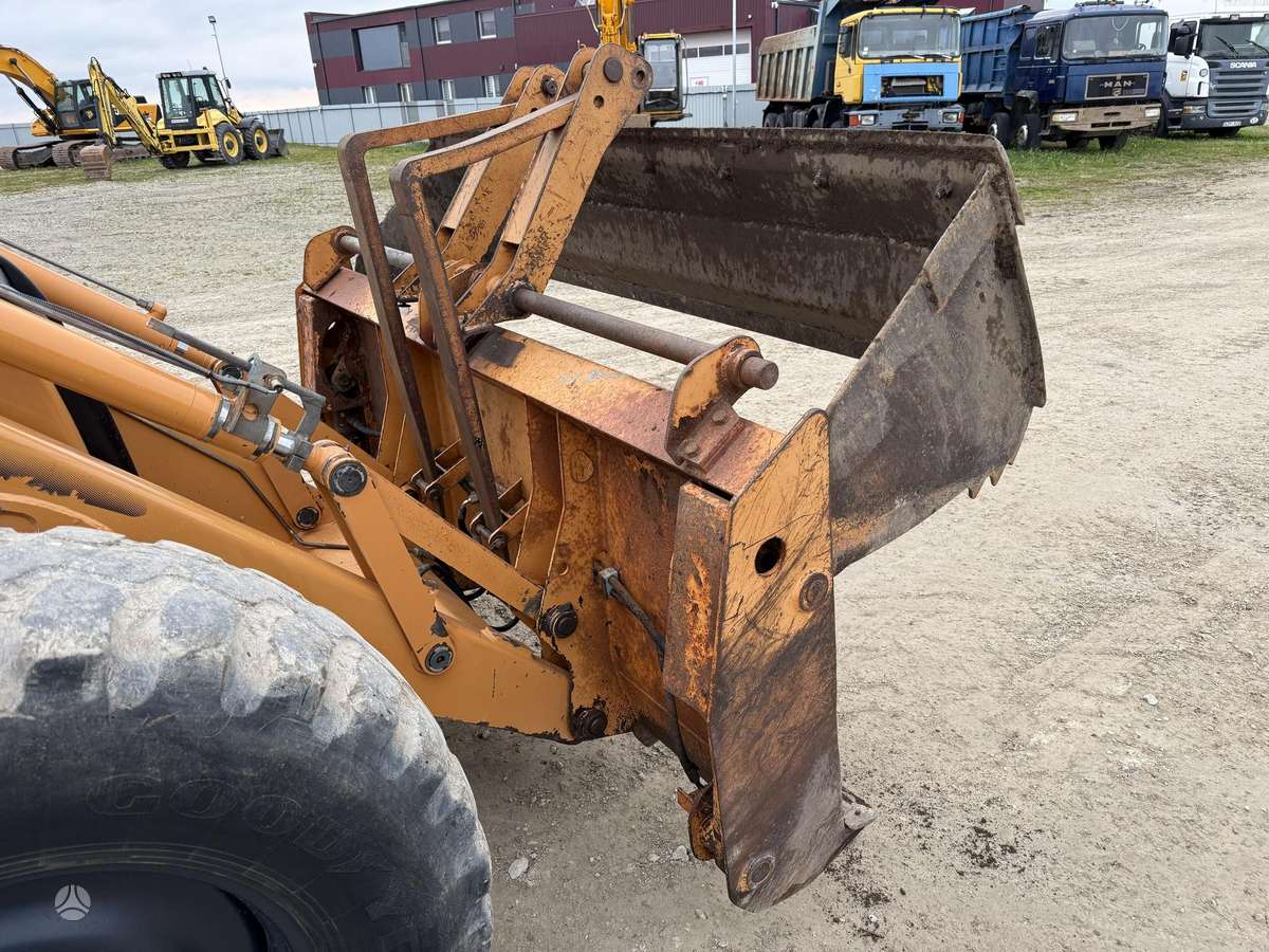 Case 695 SR-4PS, экскаваторные погрузчики