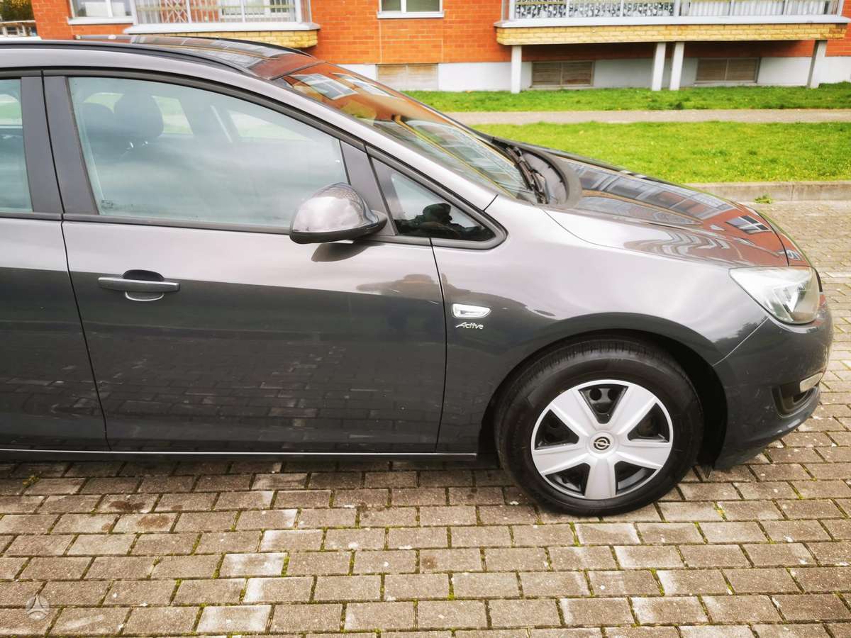 Opel Astra 2013 — photo 14