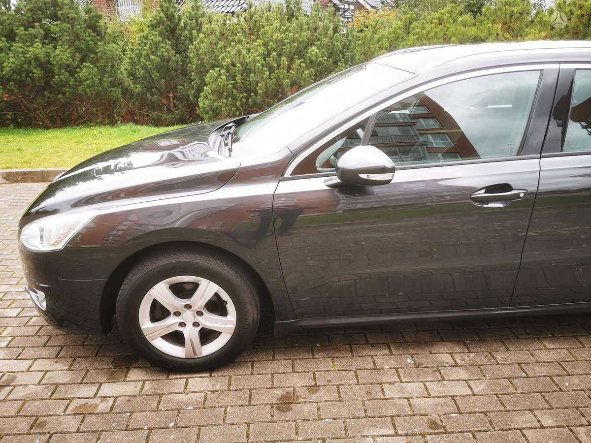 Peugeot 508 2014 — photo 11
